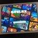 A tablet with the Roblox sign in screen.